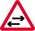 Two-way traffic across a one-way road ahead
