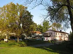 Härryda kommun, Västra Götaland, photo of residential buildings and trees in low sunlight