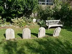 Headstones in the burial ground of the meeting house.