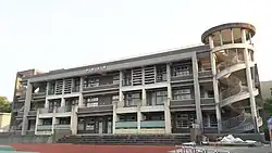 Health and Sports Building. Two walls allow outstanding students to leave their handprints, rewarding and inspiring future students.