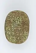 The back of a heart scarab of the singer of Amun Iakai; 1550–1186&nbsp;BC; glass; length: 4.8&nbsp;cm, width: 3.5&nbsp;cm, height: 1.5&nbsp;cm; Metropolitan Museum of Art