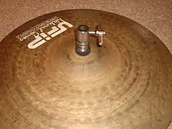 The same clutch installed on a top hi-hat cymbal