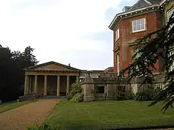 Honington Hall and attached gateways, walls and temple