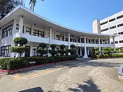 Hongjiao Building (built in 1962, two-story arc-shaped building).