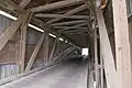 The inside of the bridge showing the Burr arch truss