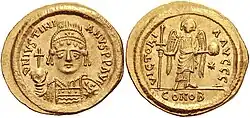Coin of Justinian I of the type found in the tomb.[5]