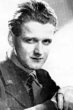 A young man in military uniform: "US" can be seen on his collars.