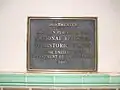 National Register Plaque affixed on the front of the building