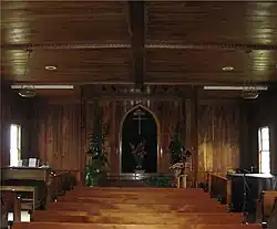 Restored koa woodwork in the interior of the Church