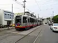 An inbound train at 15th Avenue and Taraval, 2018