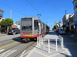 An inbound train at Taraval and 19th Avenue, 2019