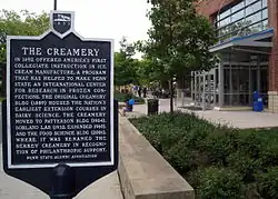 An information plaque for The Creamery erected by the Alumni Association.