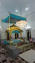 Interior view of the darbar hall of Gurdwara Darbar Sahib