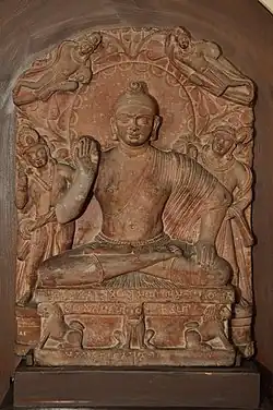 Mathura school Buddha, Northern Satraps, end of 1st century CE[10]