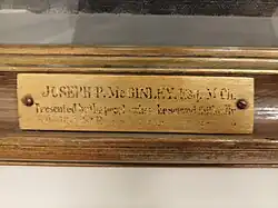 Inscription from Mc Ginley's portrait by Seán O' Sullivan paid by subscription of the people of Donegal. 'Presented by the people whom he served faithfully'.