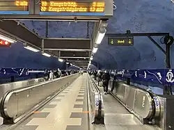 The passage between different platforms of T-Centralen station, carved in bedrock
