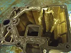 Interior and oil sump of an Tohatsu MFS30B outboard motor