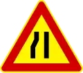 Road narrows on left