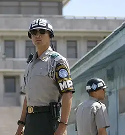 Soldier of the South Korean Military Police wearing brassard, 2007.