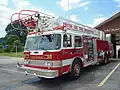 Aerial 1 serving the Jackson Fire Department, KY. 1988 Pierce Arrow 105' canopy cab