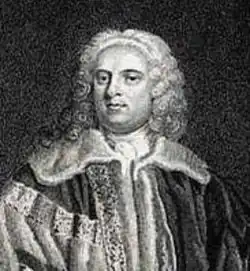 A stipple engraving showing a clean-shaven man wearing a shoulder-length wig and dressed in luxurious robes