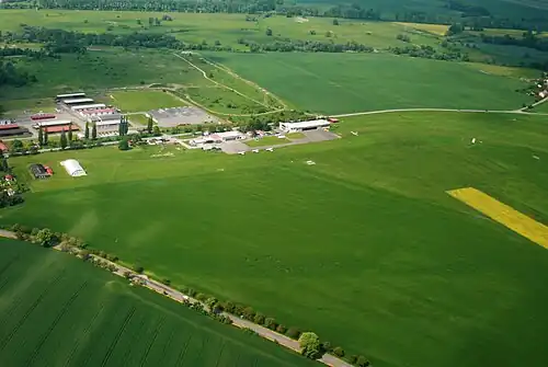 Aerial photo of Jaroměř airport, the park is the uppermost green strip seen above it.
