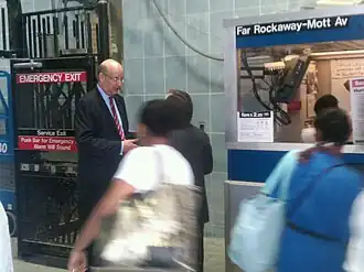 Jay Walder, then-chairman of the MTA, greets Hurricane Irene evacuees