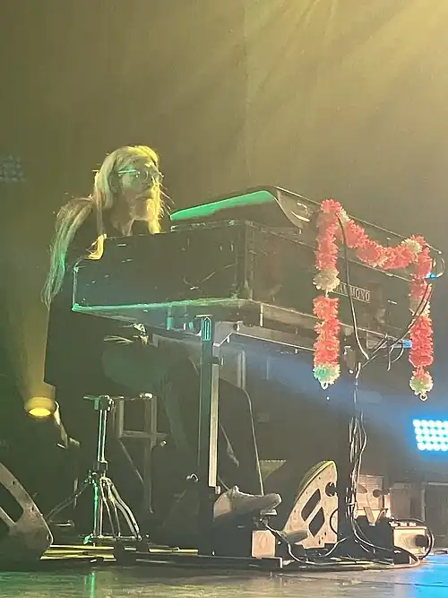 Darlington performing with Kula Shaker in 2024