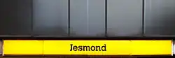 Station signage at Jesmond, branded in the original corporate colour scheme.
