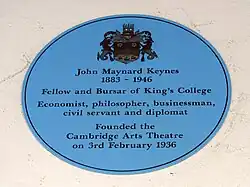 John Maynard Keynes plaque at Cambridge Arts Theatre coining him a economist, philosopher, businessman and civil servant