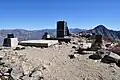 Summit of Josephine Peak showing concrete footing remnants of fire tower that was destroyed in 1976