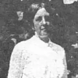 photograph is Katherine Sleeper Walden circa 1910. She is wearing a white dress.