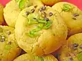 Kesar peda with Garnishing of Pistachio and Cardamom
