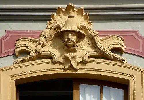 Chinoiserie mascaron above a window of the Chinese Pavilion, Ekerö Municipality, Sweden, designed by Carl Fredrik Adelcrantz, 1763–1769[36]
