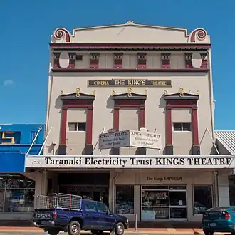 A photo of a two-storey movie theatre storefront