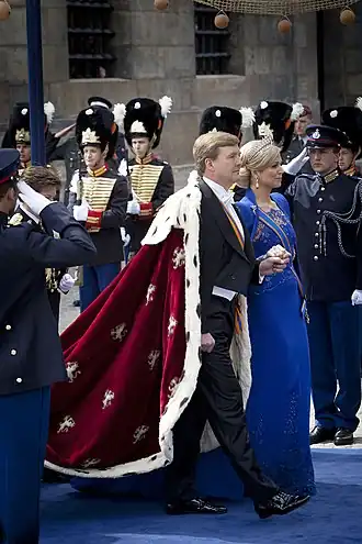 King Willem-Alexander and Queen Maxima walking to the Nieuwe Kerk on his inauguration day (30 April 2013)