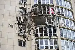 Residential building in Kyiv damaged by downed Russian drone, 8 May 2023