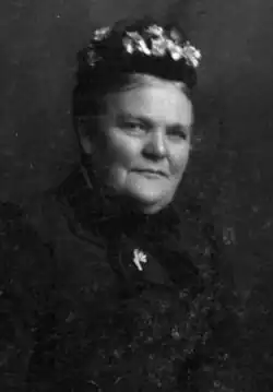 Sepia photograph of Lady Margaret Vallance Taylor wearing Edwardian dress