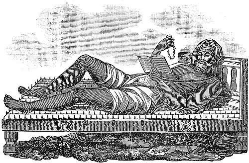 A fakir lying on a bed of nails.