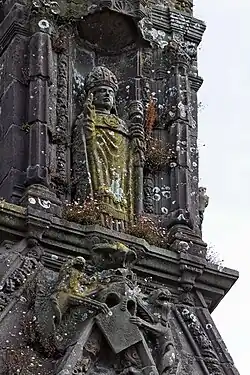 Saint Thuriau depicted in a niche in the lanteron at the top of the entrance arch. Saint Turiau is also known as Saint Tivisiau and in Breton legend was noted for his beautiful singing voice.