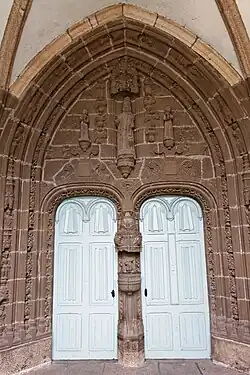 The two doors inside the porch leading to the church