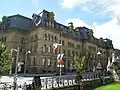 Exterior view of the Wellington Street facade of the Langevin Block, as viewed from Parliament Hill