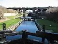 Last lock on Leeds and Liverpool Canal, links canal to Stanley Dock (1840s; Grade II)