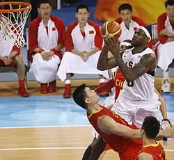 Image 11LeBron James (USA, in white) attempts a shot against China's Yao Ming at the 2008 Olympics