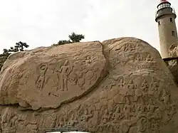 Large unfinished rock sculpture similar to Arjuna’s Penance near the light-house.
