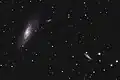 NGC 4217 (lower right) next to M106