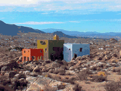 Side from hillside above dwelling.