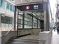A subway in Hong Kong leading to an underground MTR station and shopping centres