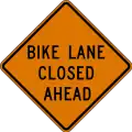 CW20-5b Bike lane closed (distance) ahead