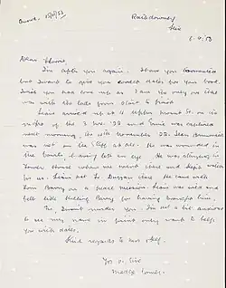 "One-page handwritten letter in blue ink on a cream background"